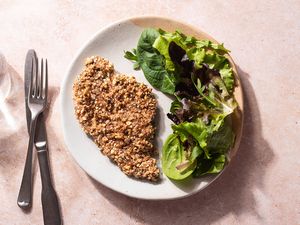 Almond Crusted Chicken and salad on a plate 