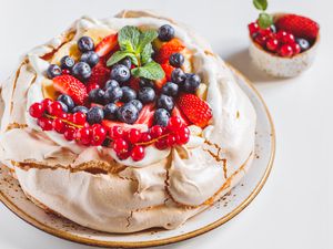 New Zealand Pavlova with fresh berries and red currants