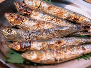Baked sardines on a plate
