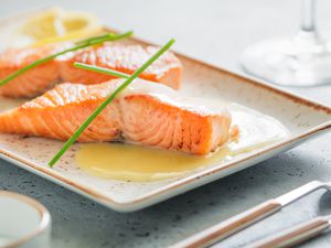 Beurre Blanc sauce on a platter of salmon