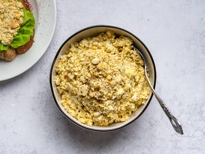 Classic Egg Salad With Relish in a bowl, with a spoon 