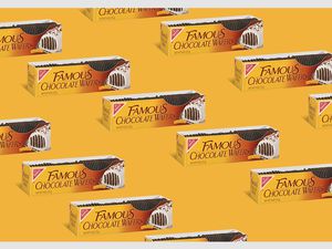 famous chocolate wafer cookie in package on yellow background