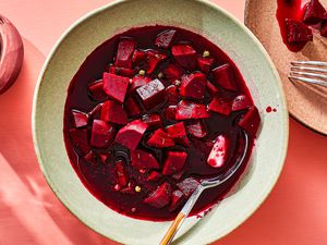 Fermented Beets in a bowl with a spoon 