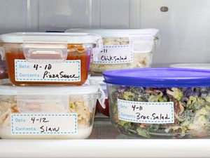 Refrigerator containers with labels.