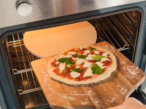 Transfer pizza to oven