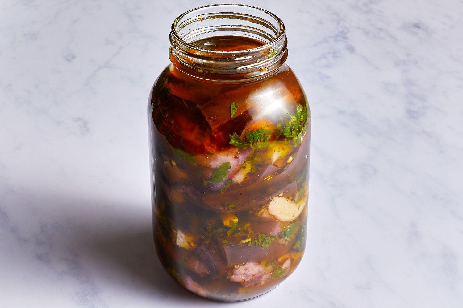 Pickled eggplant mixture in a quart jar