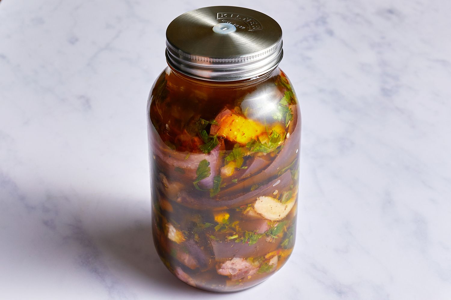 Jar with pickled eggplant closed with a screwtop lid