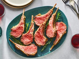 Sliced rack of lamb on a platter