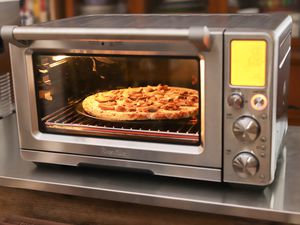 Breville Joule Oven Air Fryer Pro with a pizza inside
