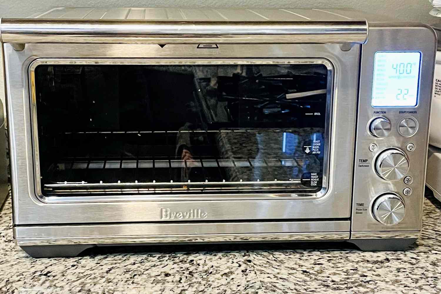 A Breville Smart Oven Air Fryer displayed on top of a kitchen counter