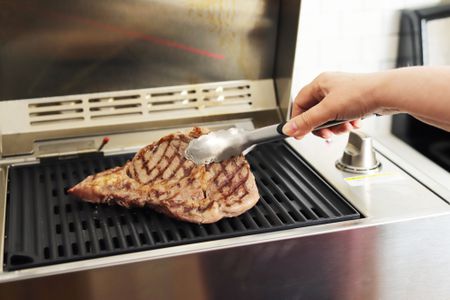 Grilling a steak on the Kenyon city grill 