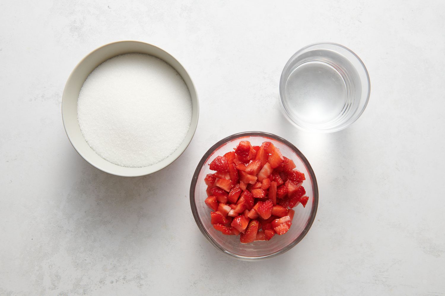 Ingredients to make strawberry simple syrup
