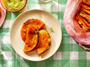 Tacos de Canasta on a plate and in a bag 