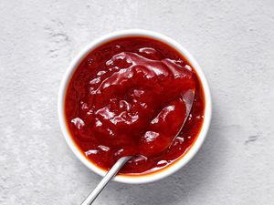 Banana Ketchup in a bowl with a spoon 