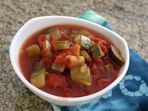 Zucchini and tomatoes stewed in bowl